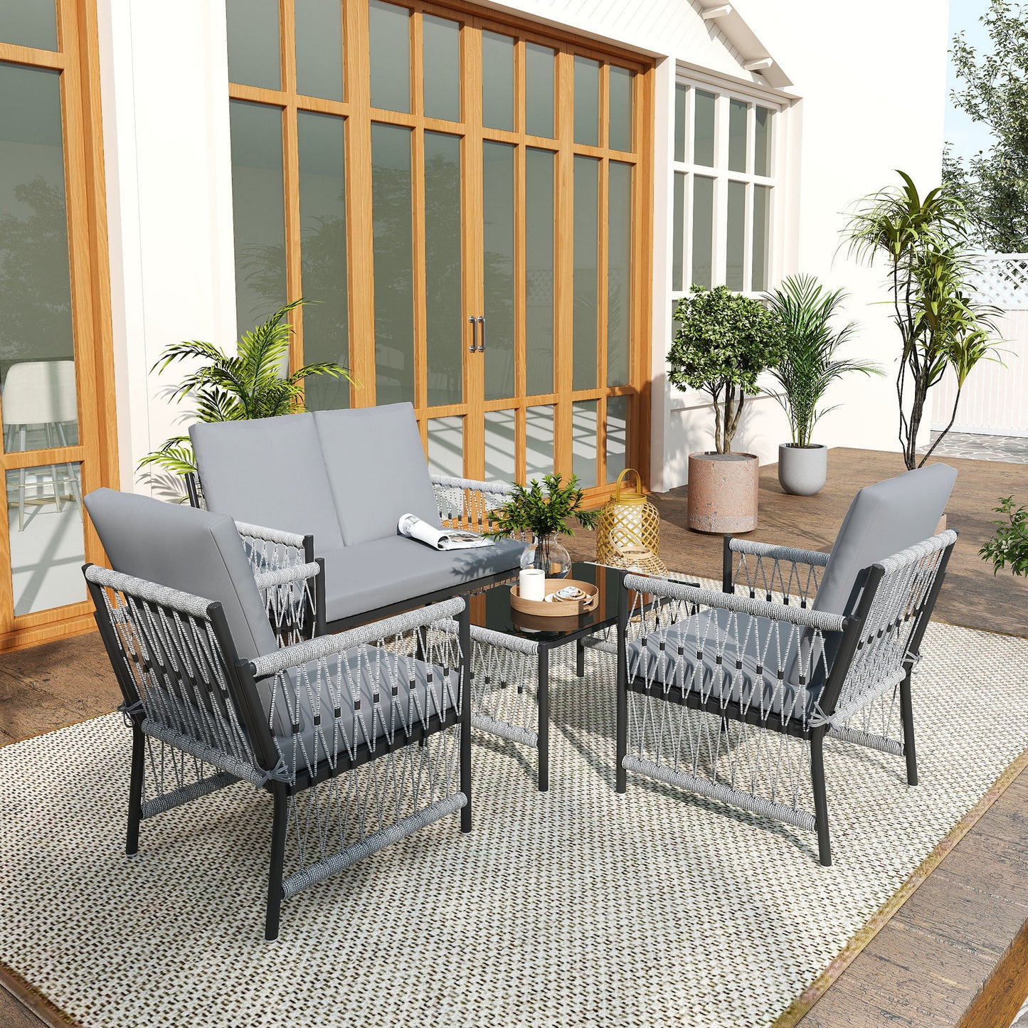 Outsunny 4 Piece Rattan Garden Furniture Set, 4 Seater Wicker Patio Conversation Set with 2 Armchairs, Loveseat, Glass Top Coffee Table and Cushions