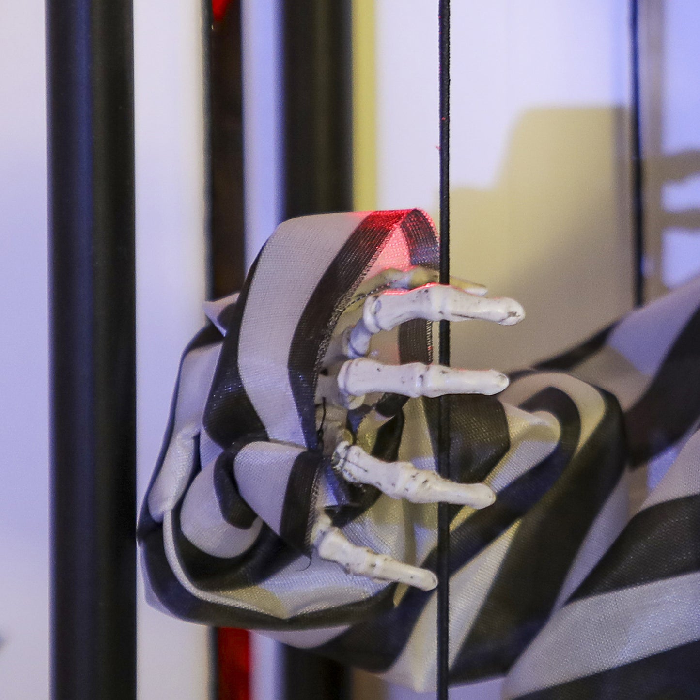 Halloween Animated Hinging Skeleton Prisoner in Cage with Glowing LED Eyes, Spooky Skeleton Scary Halloween Decorations, Battery Operated, Indoor Party Props