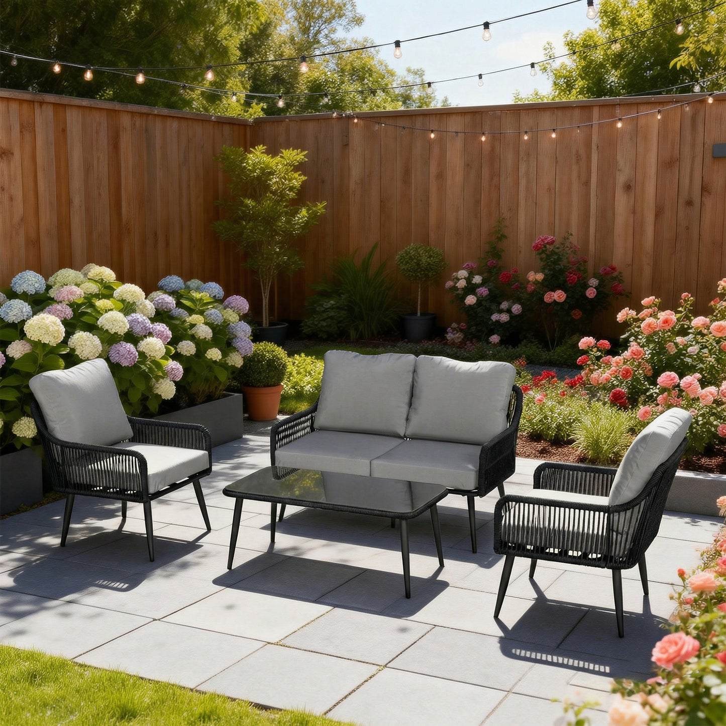 4 Piece Rattan Garden Furniture Set | Loveseat | 2 Chairs | Coffee Table | Tempered Glass | All-Weather PE Rattan | Galvanised Steel | Water-Repellent Cushions | 240kg | Black