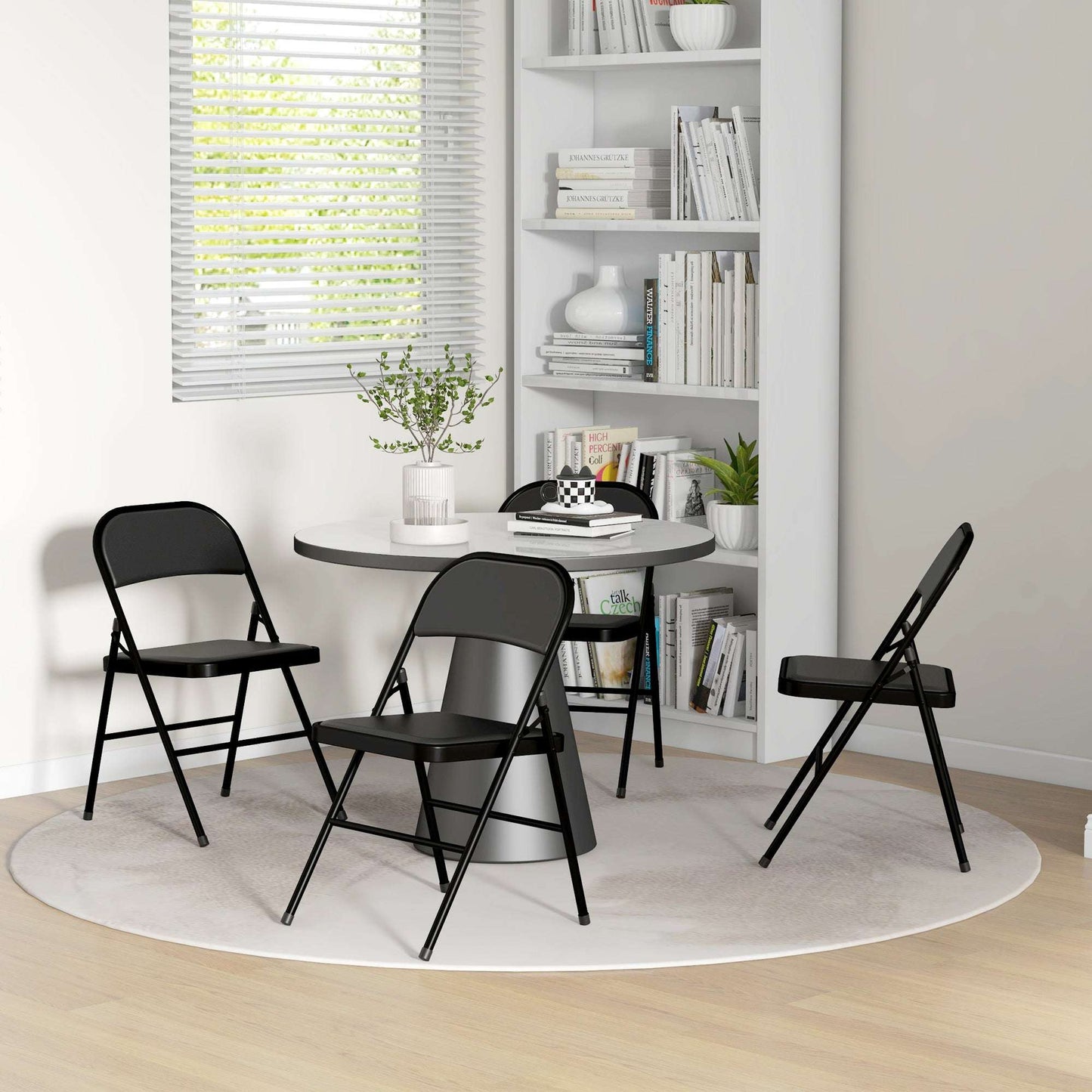 Set of Four Cushioned Steel Folding Dining Chairs - Black