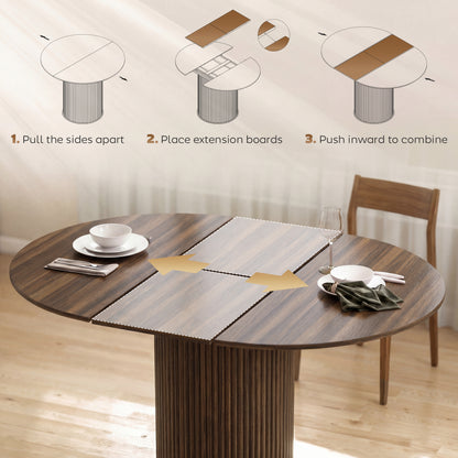 Extendable Dining Table | 110–150cm Round to Oval | Dark Walnut-Effect Finish & Fluted Pedestal Base | Hidden Extension Leaf Storage | Seats up to 6–8