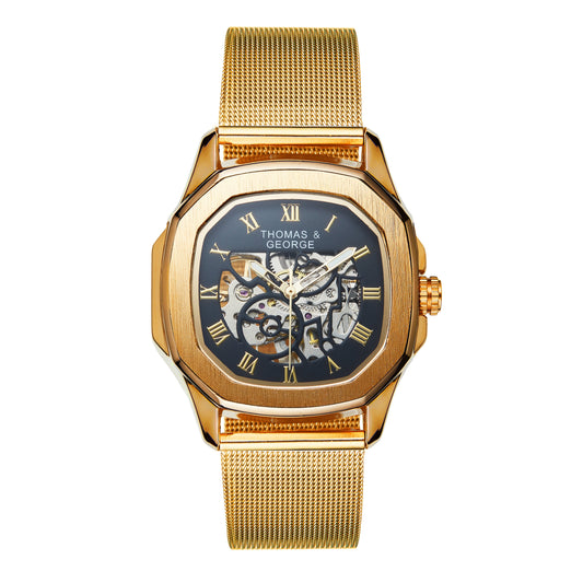 Thomas & George Berlin Gold Edition Automatic Skeleton Watch | Cushion-Shaped Gold-Tone Alloy Case & Roman Numeral Dial | Stainless Steel Mesh Strap