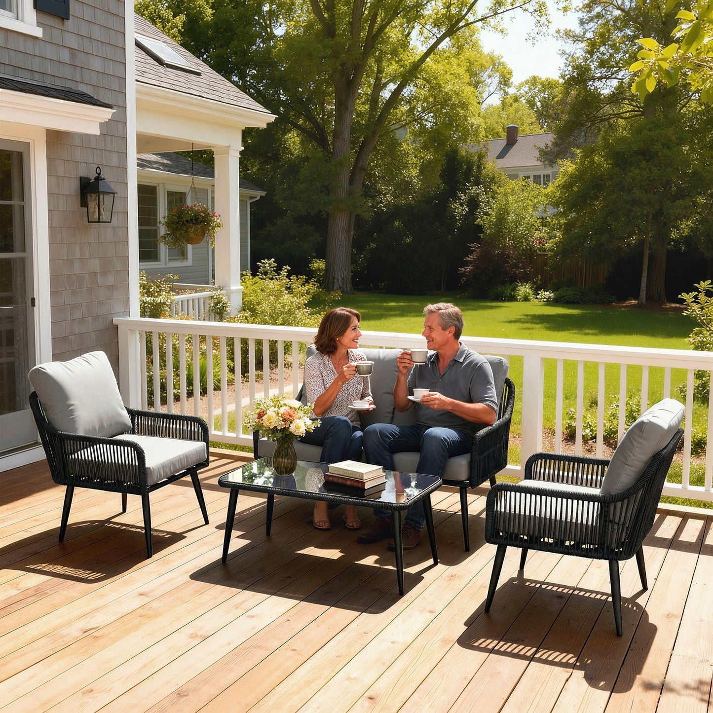 4 Piece Rattan Garden Furniture Set | Loveseat | 2 Chairs | Coffee Table | Tempered Glass | All-Weather PE Rattan | Galvanised Steel | Water-Repellent Cushions | 240kg | Black