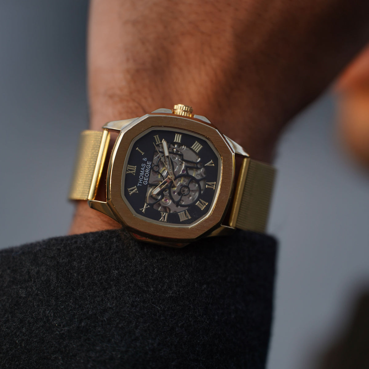Thomas & George Berlin Gold Edition Automatic Skeleton Watch | Cushion-Shaped Gold-Tone Alloy Case & Roman Numeral Dial | Stainless Steel Mesh Strap