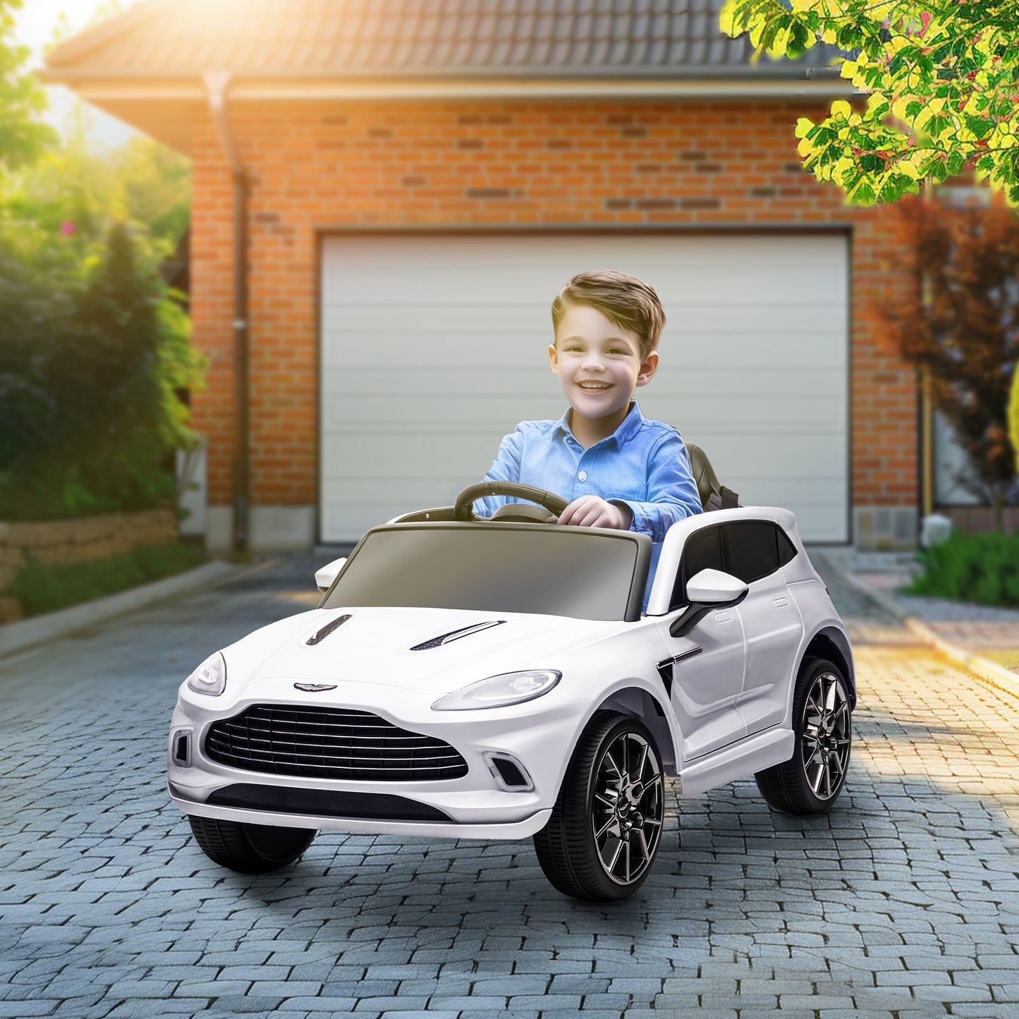 Licensed Aston Martin DBX Licensed Battery Powered Kids Electric Car, 12V Kids Ride on Car w/ Lights, Music Horn, White / Pink