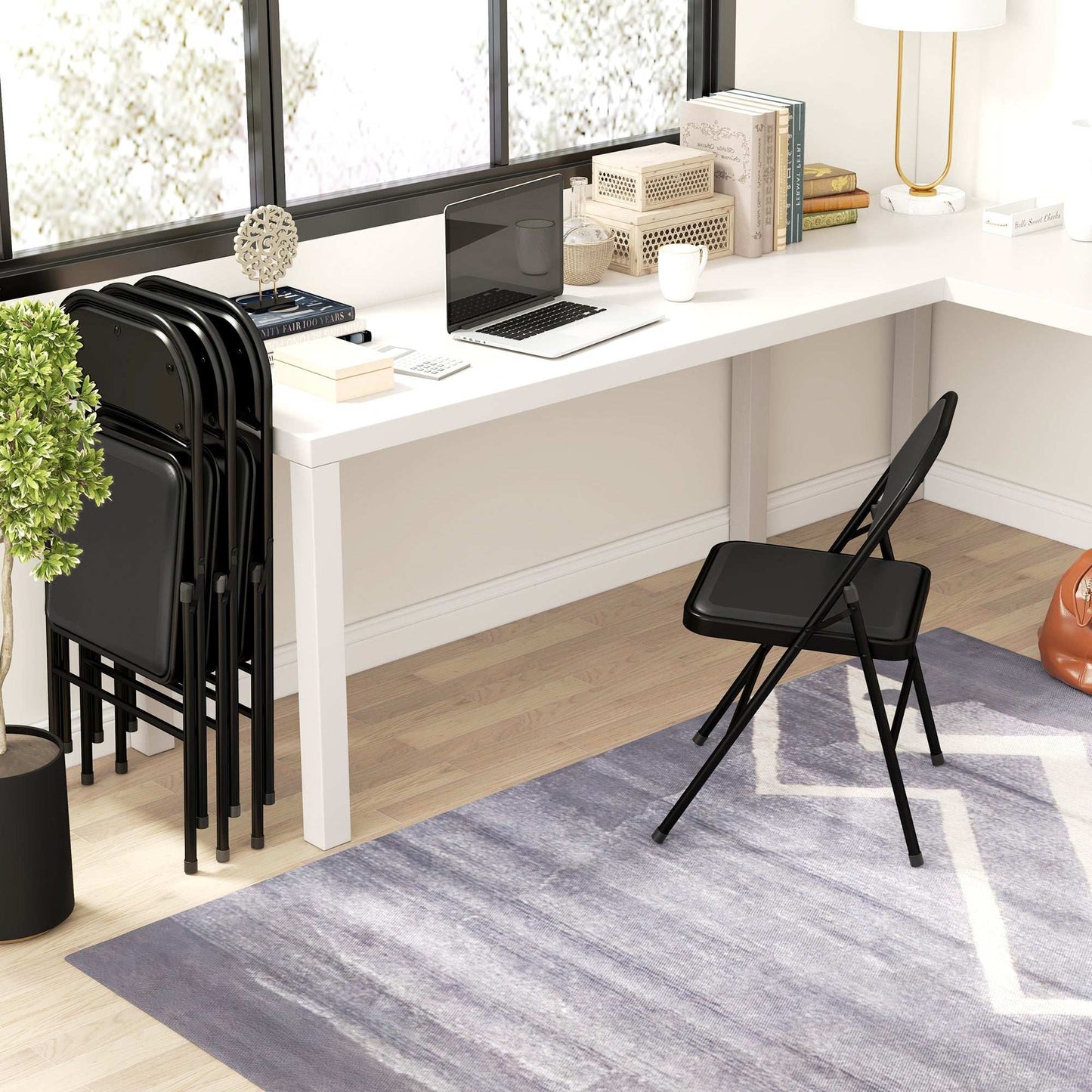Set of Four Cushioned Steel Folding Dining Chairs - Black