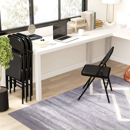 Set of Four Cushioned Steel Folding Dining Chairs - Black