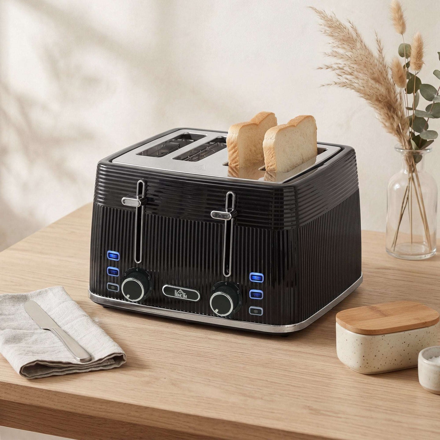 4-Slice Toaster | Dual Independent Controls | 7 Browning Settings | Defrost Reheat Cancel | Auto-Centering Guides | 2 Removable Crumb Trays | 1560-1860W | 29.3x27.3x18.9cm | Black