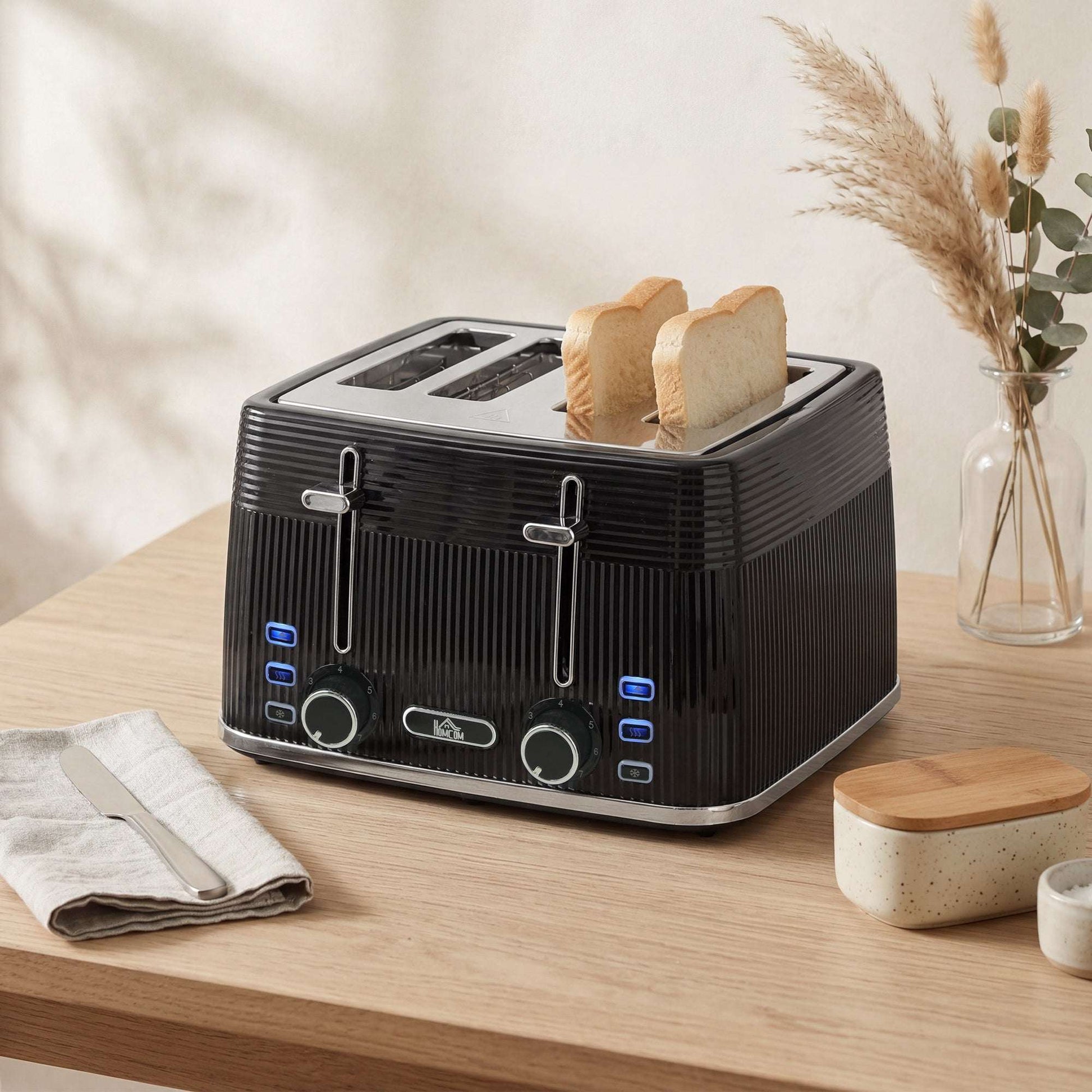 4-Slice Toaster | Dual Independent Controls | 7 Browning Settings | Defrost Reheat Cancel | Auto-Centering Guides | 2 Removable Crumb Trays | 1560-1860W | 29.3x27.3x18.9cm | Black