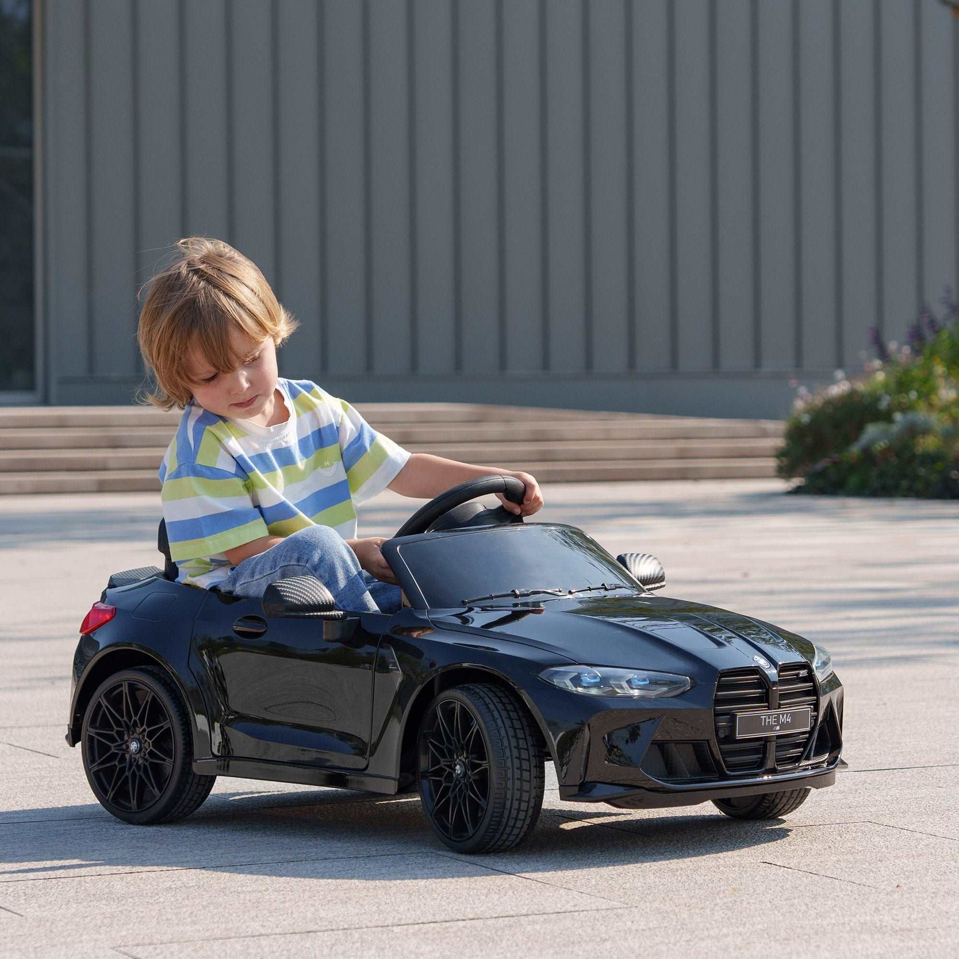 12V BMW M4 Licensed Kids Car with Easy Transport, Remote Control, Suspension, Music, Horn, LED Lights